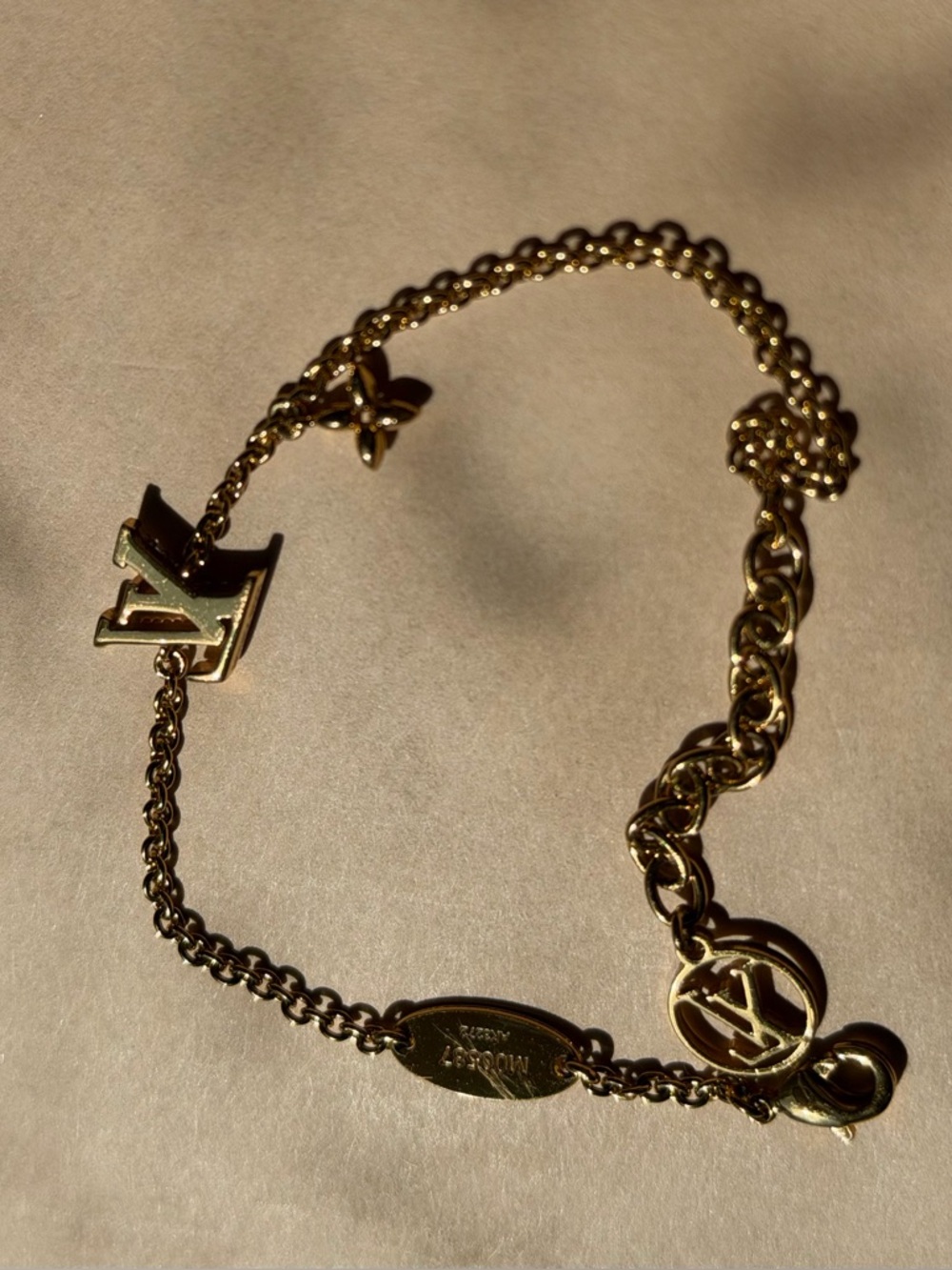 Louis Vuitton Gold-Tone Pavé LV Charm Bracelet - Picture 9 of 10